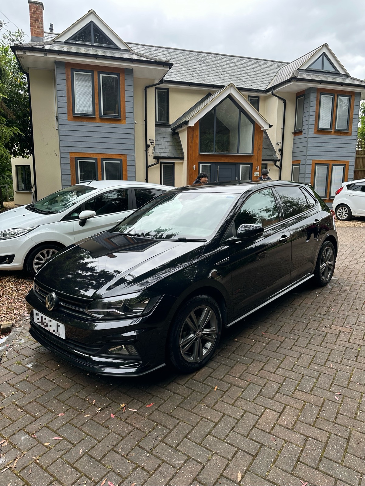 Gleaming black VW Polo after an exterior valet